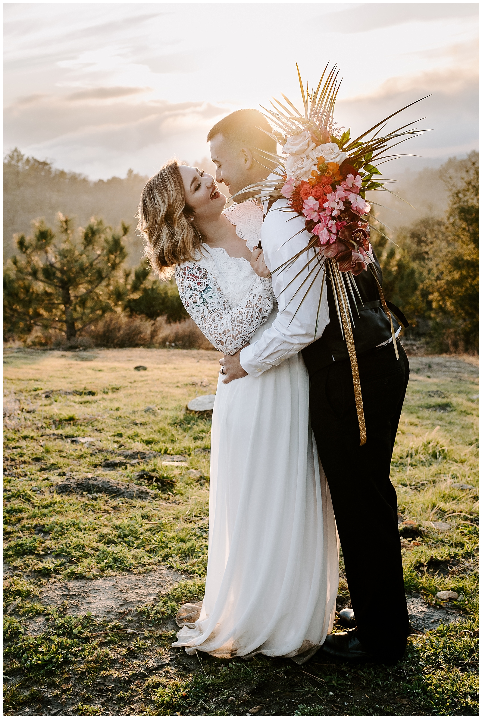 adventurous couple enjoys a first kiss during their mountain elopement in California
