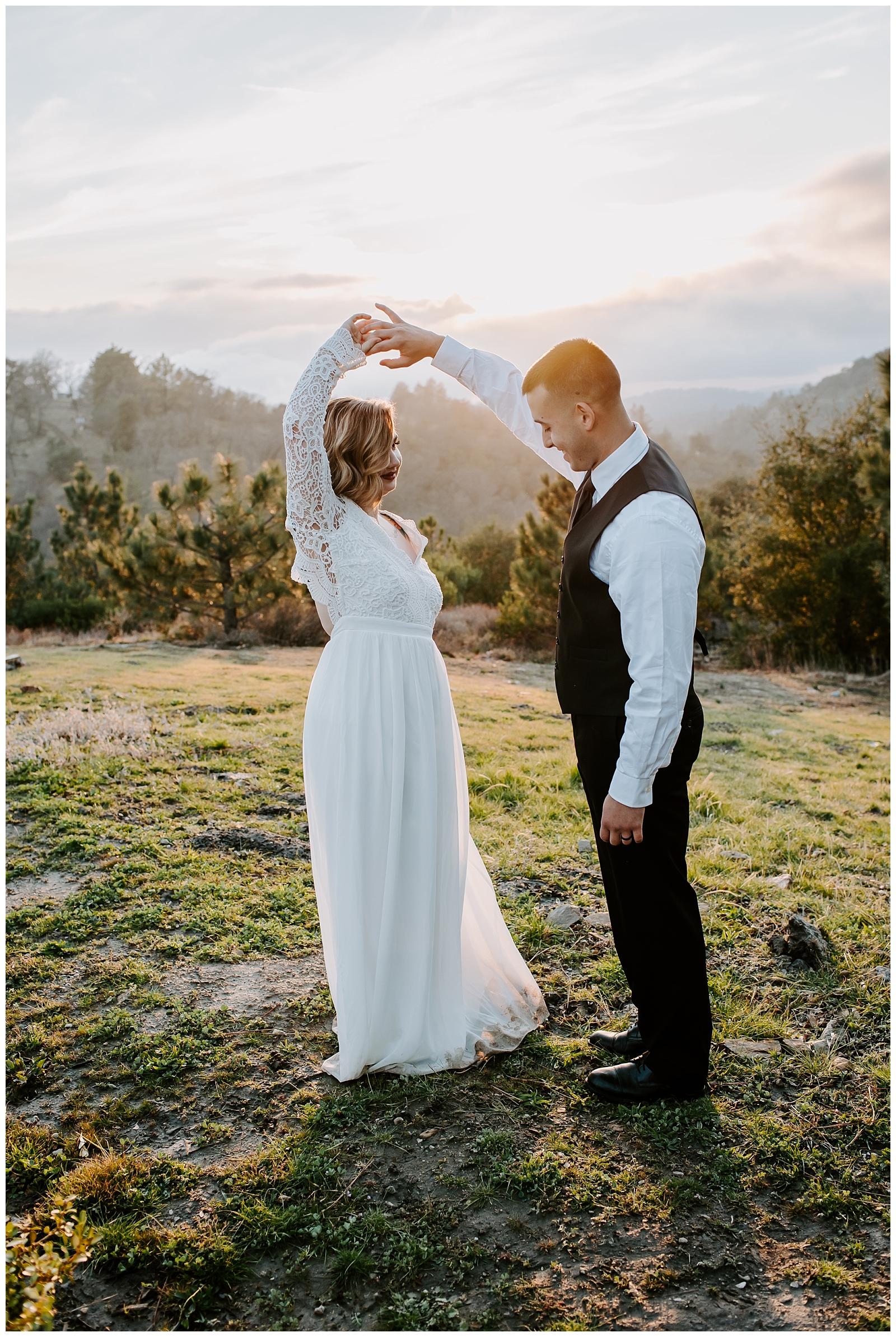 Bride and groom share a first dance at sunset during their elopement