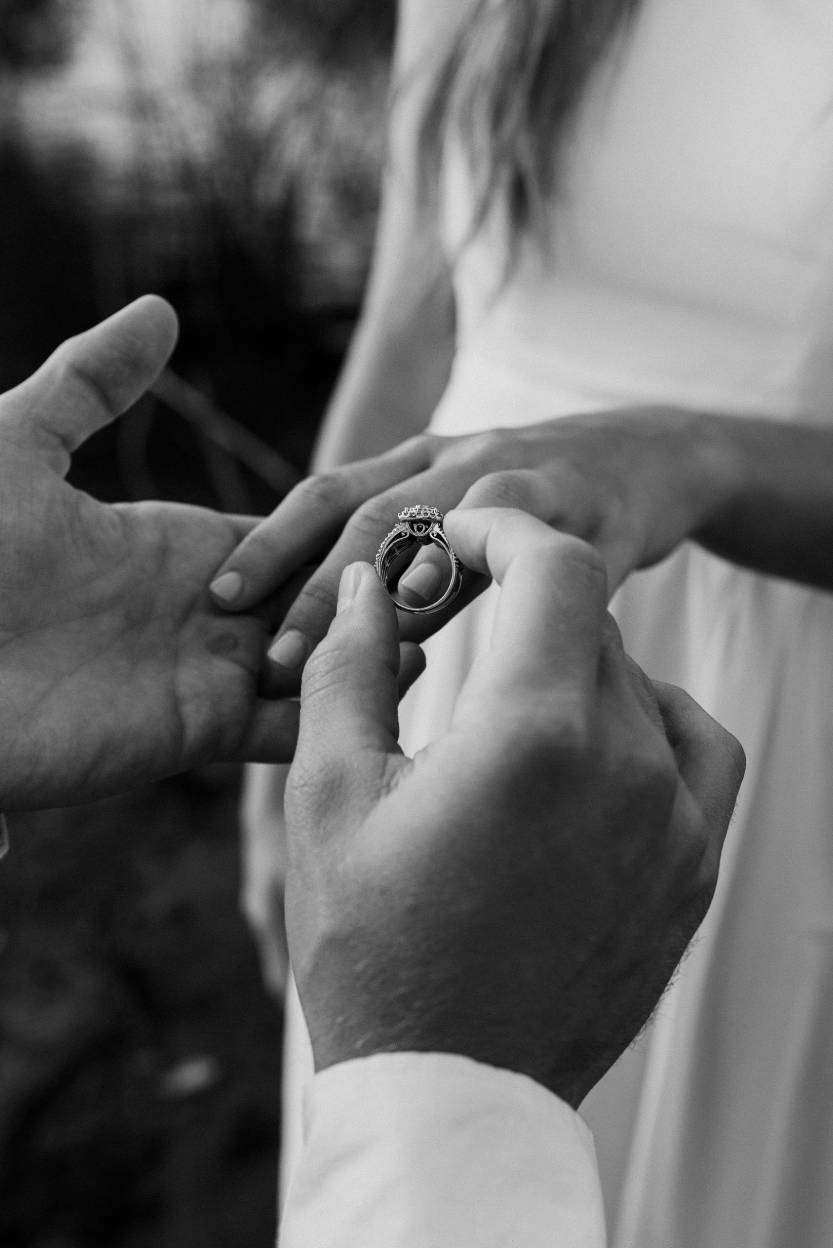 A beautiful elopement ceremony as couple exchanges rings.