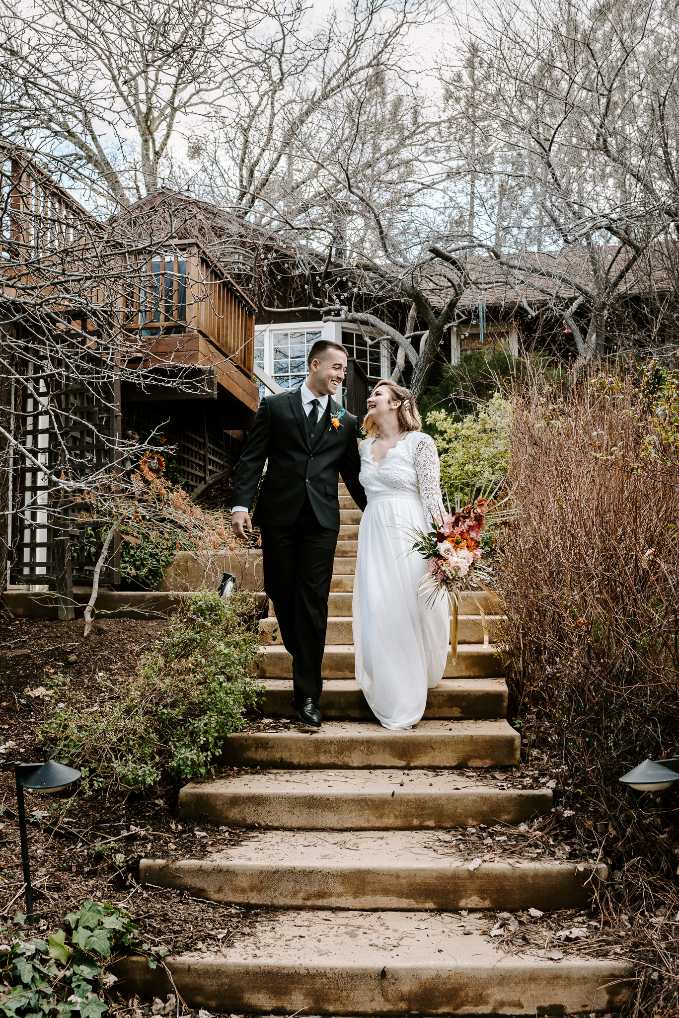 bride and groom walk to ceremony spot during their Airbnb Elopement