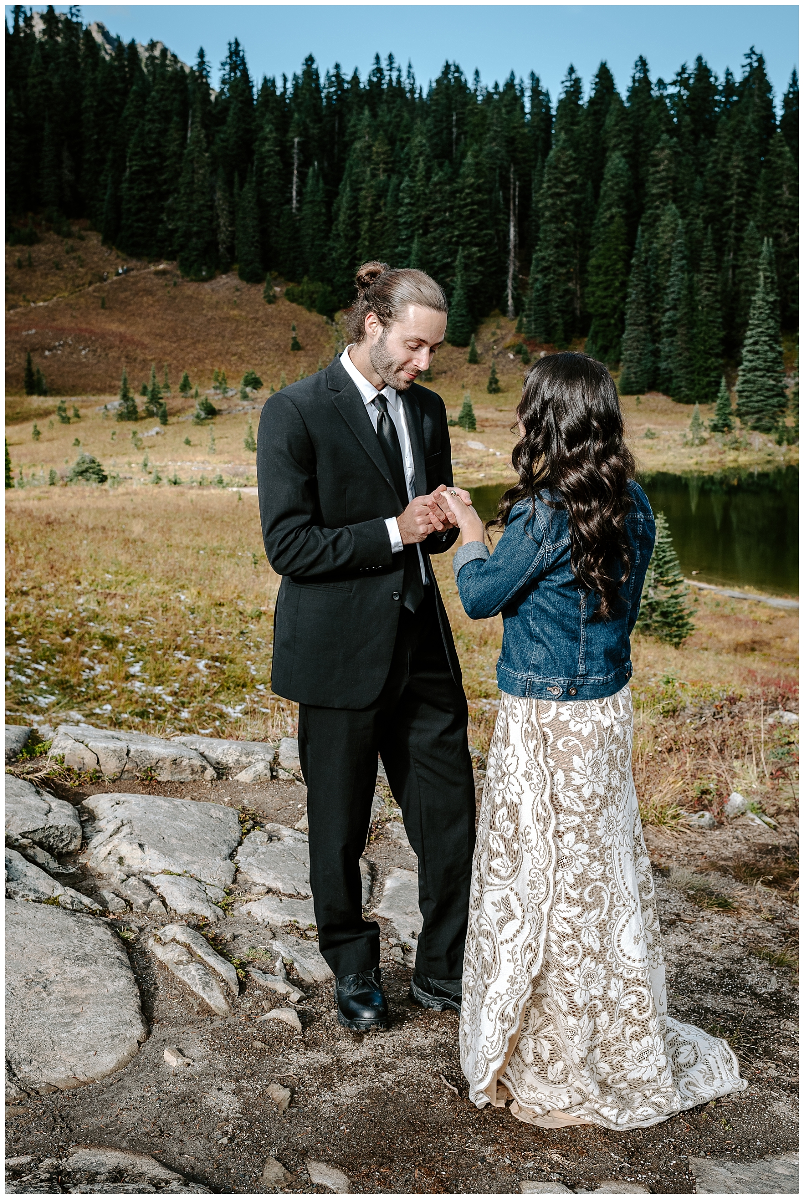 bride and groom say vows at a-frame cabin elopement