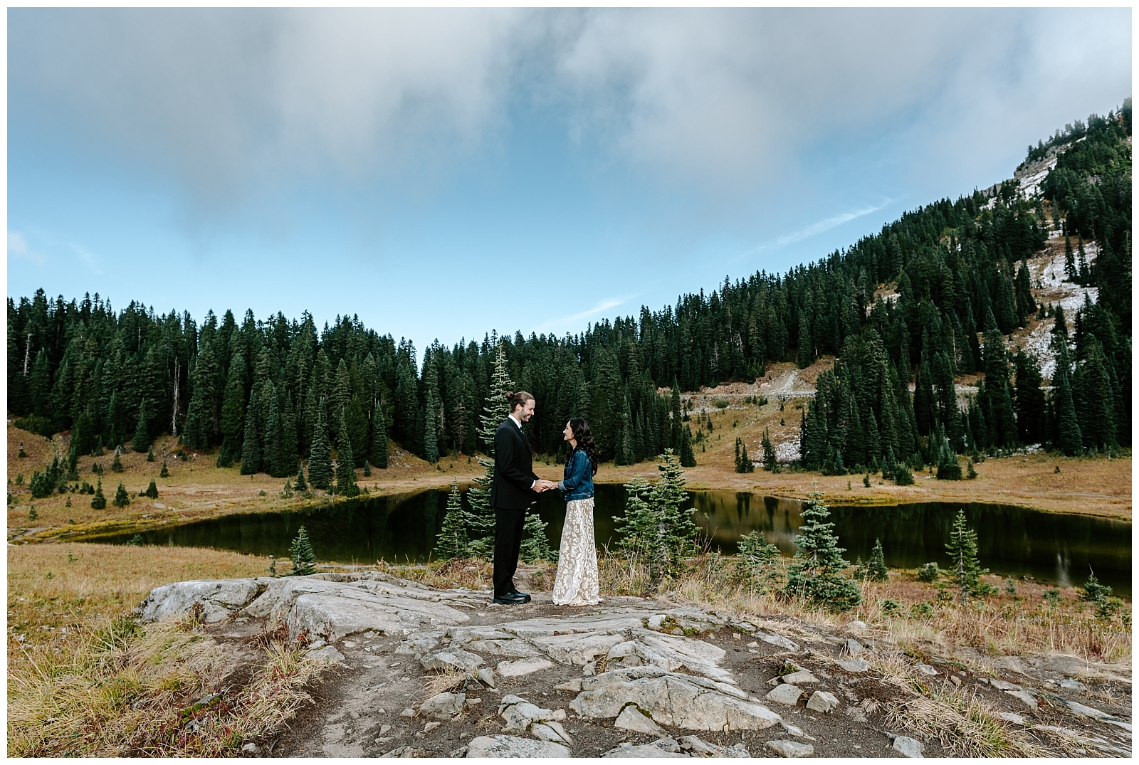 bride and groom say vows at a-frame cabin elopement