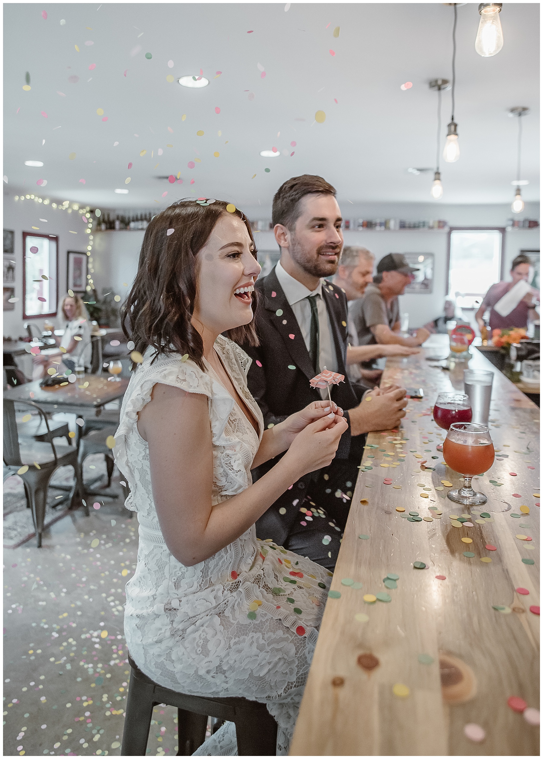bride and groom go to a bar before their elopement ceremony