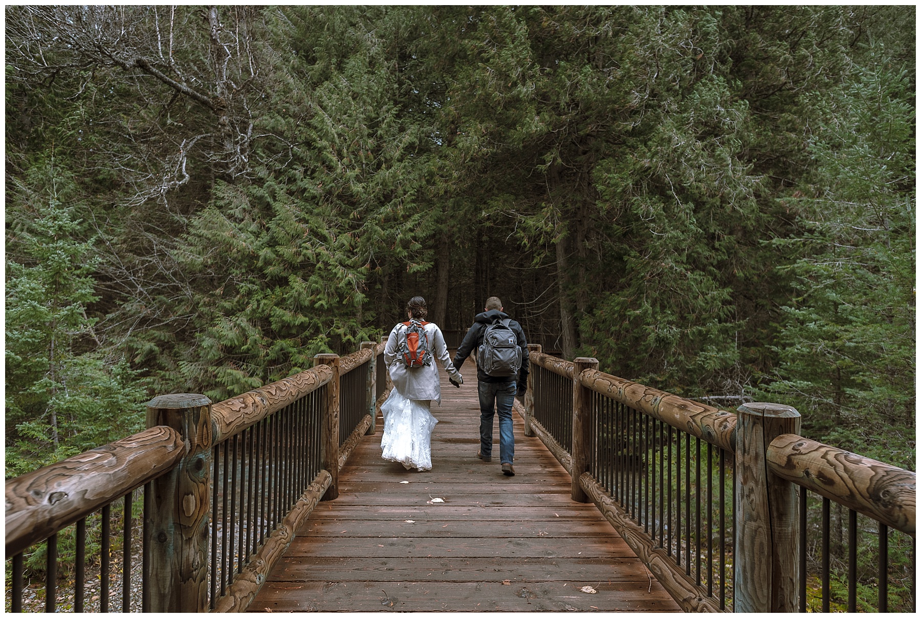 adventurous couple hikes to avalanche lake for elopement